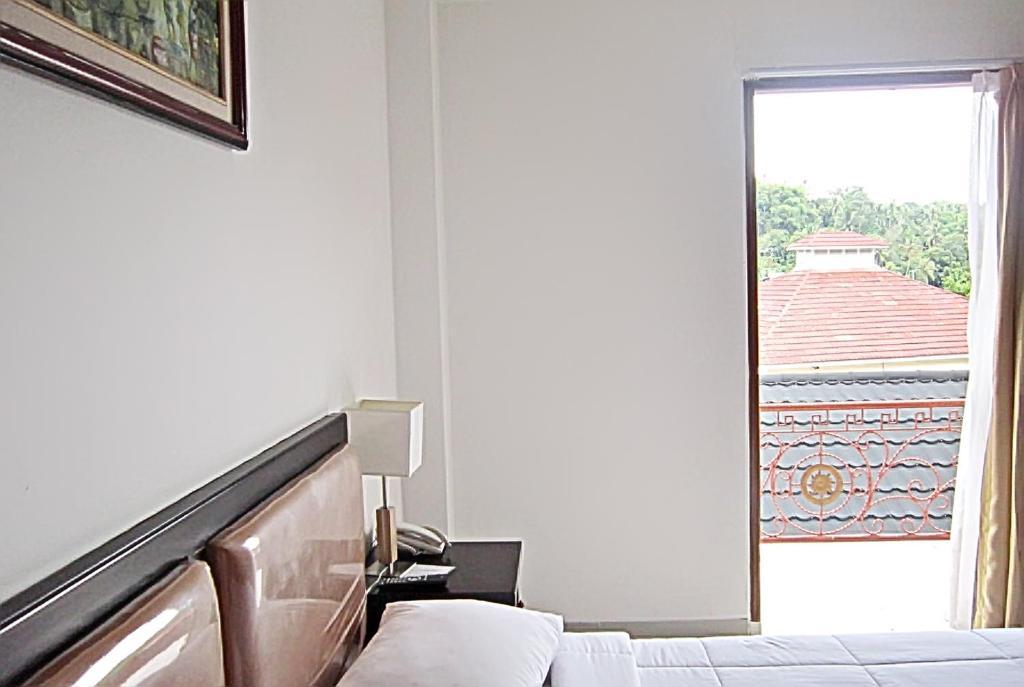 Parai City Garden Hotel - Sawahlunto Phòng bức ảnh